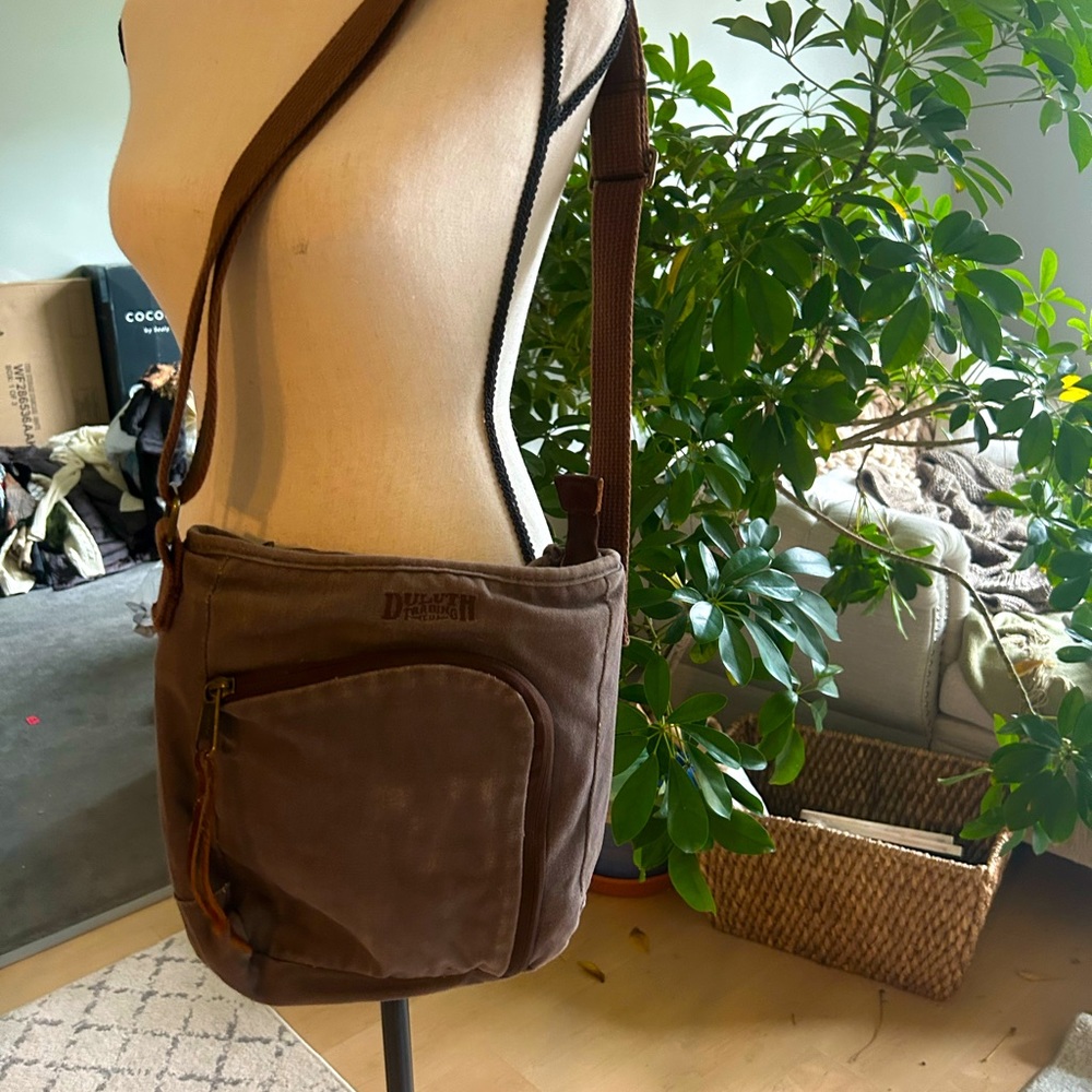 This soft canvas cross over bag is perfect for books, electronics and anything!